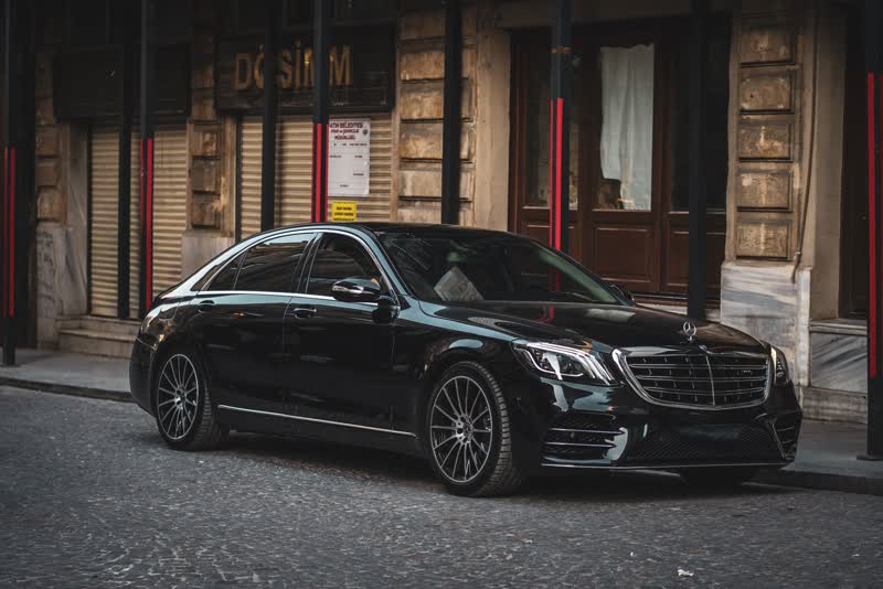 Executive Sedan — black chauffeured vehicle